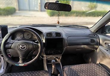 Mazda: Mazda Familia: 2004 г., 2 л, Кол менен иштөөчү, Газ, Хетчбек — 3