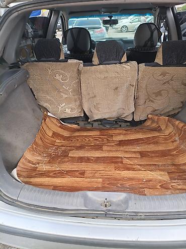 devo tiko: Nissan Almera Tino: 2003 г., Минивэн — 7