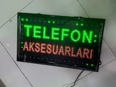 Reklam lövhələri: Telefon aksesuarları yazısı işıqlı yenidir işlənməyib. 35 azn alınıb