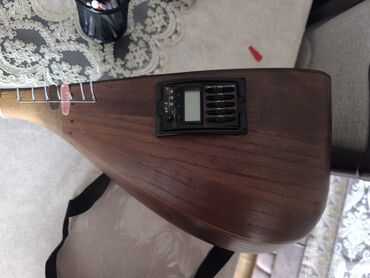 серебряные струны для гитары: Elektro saz – quraşdırılmış preamp və tuner ilə. Xüsusiyyətlər: -