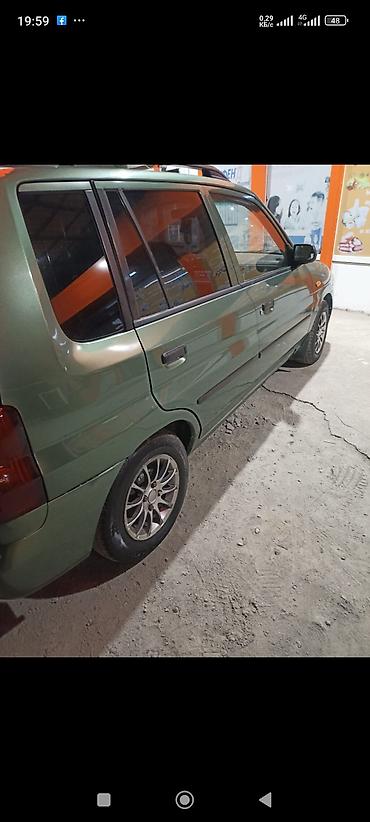 cx 9: Mazda Demio: 2000 г., 1.5 л, Автомат, Бензин, Минивэн — 3