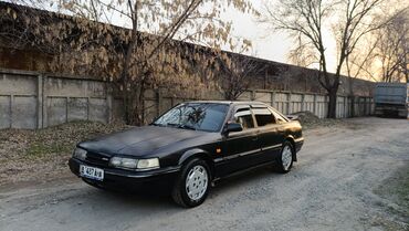 обмен на малалитрашку: Mazda 626: 1992 г., 2 л, Механика, Бензин, Хетчбек