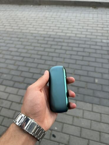 Qəlyan, vayp və aksesuarları: IQOS DUO3 tütün qızdırıcısı, tünd turkuaz rəngdə. Kompakt dizaynı onu lalafo.az -da Qəlyan, vayp və aksesuarları: IQOS DUO3 tütün qızdırıcısı, tünd turkuaz rəngdə. Kompakt dizaynı onu