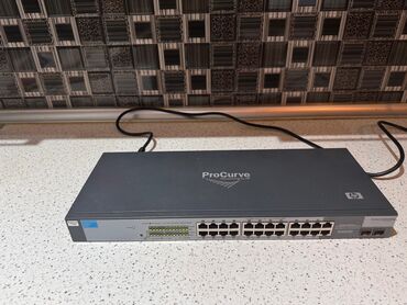 modem almaq: ProCurve Switch 1700-24. J9080A. Yaxwi veziyyetdedir. Iwlekdir