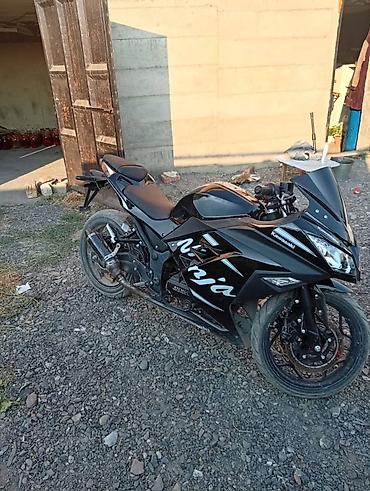 игрушечные мотоциклы: Спортивный мотоцикл Kawasaki Ninja (чёрный) - Кузов: полностью в — 5