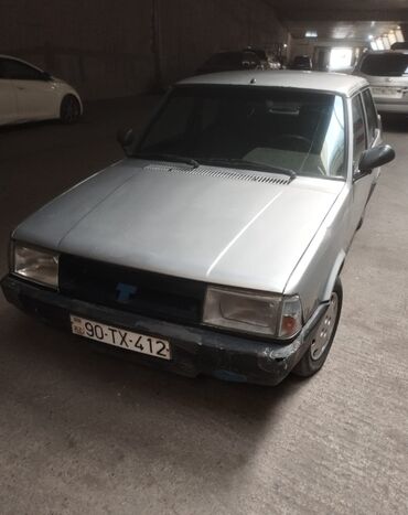 Tofas: Tofaş Şahin/Doğan (sedan) – gümüşü rəng Xüsusiyyətlər: - Kuzov: 4 — 6