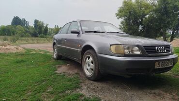 ауди рс6 цена бишкек: Полноразмерный седан Audi серого цвета, оснащенный четырьмя дверями