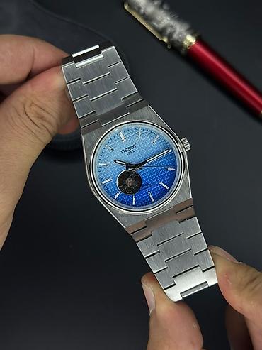 3d saat: Tissot gent saatı – paslanmayan poladdan inteqrə edilmiş qolbaqlı — 1