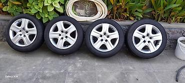 265 60 18 təkər satışı: Hyundai orijinal 15” yüngül lehimli disklərlə birlikdə komplekt təkər — 2