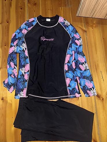 alt geyim: İki hissəli idman/üzgüçülük dəsti - Üst geyim: Uzunqol rashguard — 1
