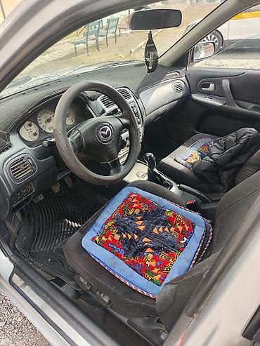 Транспорт: Mazda 323: 2002 г., 1.6 л, Механика, Бензин, Универсал — 6