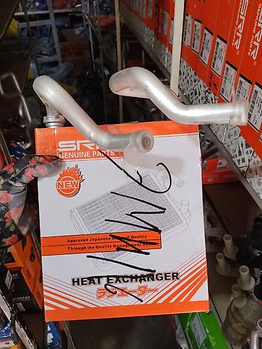 Теплообменник отопителя (радиатор печки) SRR Genuine Parts -