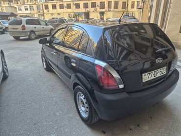 Kia: Kia Rio: 1.4 l | 2009 il Sedan — 7