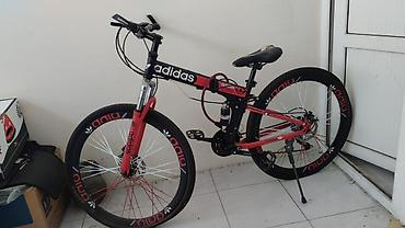 Velosiped – dağ tipli, 26” təkərlər - Rəng: qırmızı/qara, üzərində