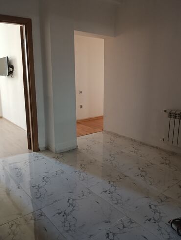 gəncə prospekti kirayə evlər: Yeni tikili 17 mərtəbəli binanın 12 mərtəbəsində mənzil Kirayə verilr