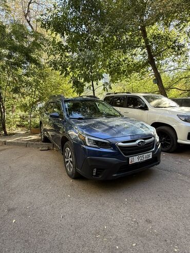 фара субару аутбек: Автомобиль Subaru Outback синего цвета, оснащенный рейлингами на крыше