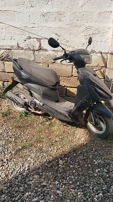 Mopedlər,skuterlər: Şəhər içi rahat sürüş üçün kompakt skuter. Xüsusiyyətlər: - Bədən — 7