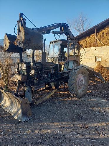 Ekskavatorlar: Ekskavator-yükleyici (traktor bazalı) – ön bıçaq və arxa ekskavator — 1