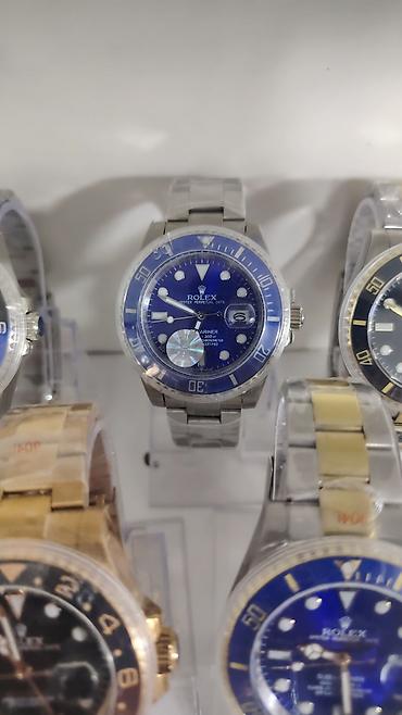 saat omega: Rolex kişi qol saatları – müxtəlif modellər - Korpus və bilərzik — 2