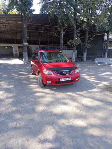 всвязи с переездом: Красный минивэн Mazda MPV с рейлингами на крыше и спойлером. 2000год