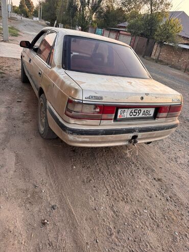 обмен машинами с доплатой: Mazda 626: 1990 г., 2 л, Механика, Бензин, Седан