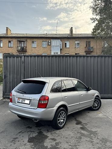 rexton j4: Mazda Familia: 2002 г., 1.6 л, Механика, Бензин, Хэтчбэк — 3