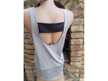 svečane i elegantne haljine: F&F fitness majica vel M