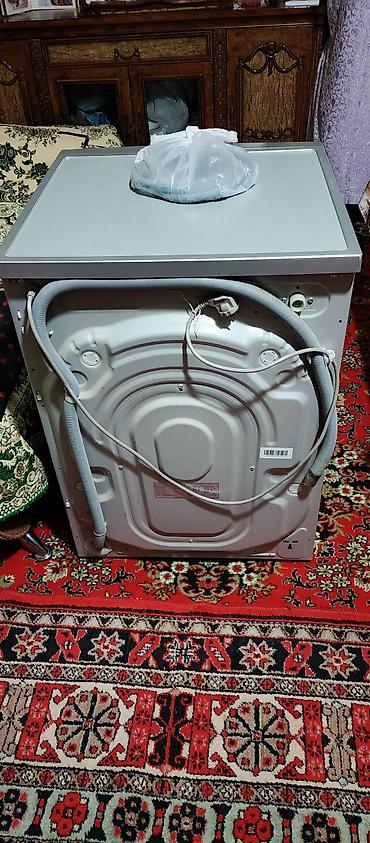 2 antenli modem: Hoffmann WFL-8114S paltaryuyan maşın - Ön yükləməli, gümüş rəngli — 2