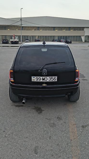 opel stra: Avtomobil: Opel Corsa B (5 qapı, hetçbek) Rəng: Qara, tam qara üslub — 4