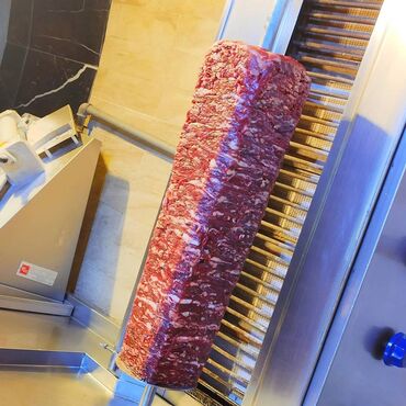 Sifarişlə hazır yeməklər: Məhsul: Odun közündə bişən ət dönər Xüsusiyyətlər: - Şaquli şişdə — 11