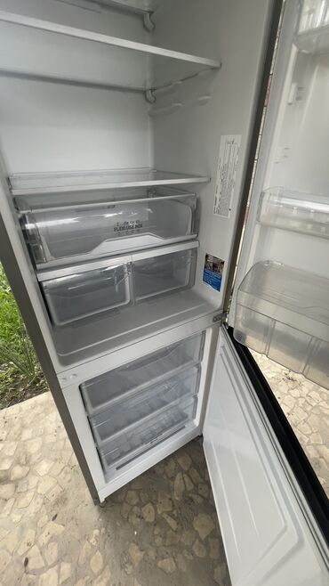 Техника для кухни: Холодильник Indesit, Б/у, Двухкамерный, 70 * 200 *