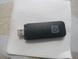 сетевой хаб: USB 3G/4G модем с разъёмом USB-A Описание: - Компактный USB‑модем для