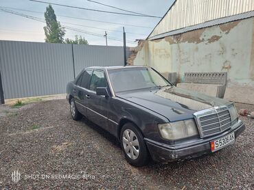 домкрат w210: Mercedes-Benz E‑Class (W124), седан, черный цвет кузова. Классический