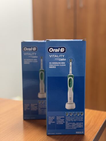 Электрические зубные щетки: Электрическая зубная щетка Oral-B Новый