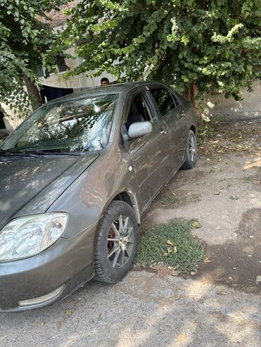 машина электронный: Toyota Corolla: 2004 г., 1.4 л, Механика, Бензин, Седан