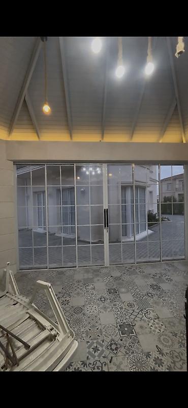 Arakəsmə qapılar: Alüminium sürgülü panoramik qapı sistemi - Material: yüksək — 2