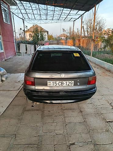 Opel: Opel Astra F hatchback Xüsusiyyətlər: - Korpus: 5 qapılı hatchback - — 5