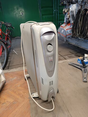 обогреватели маслянные: Масляный обогреватель Кол-во секций: 10 и более, Несколько режимов мощности