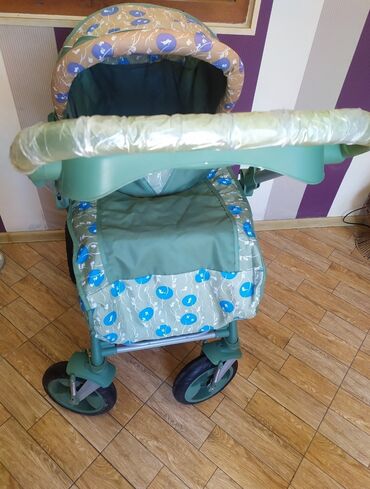 Digər detal və aksessuarlar: Qiş yay kolyaskası.Az işlənib.Yeni kimidir.Evde yer yoxdu deye — 2