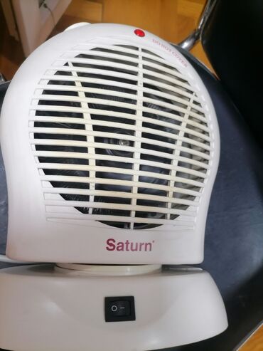 Kaloriferi: Grejalica duvaljka 2 brzine plus ventilator Saturn 2000w Okreće pri — 9