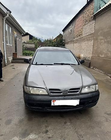 тиков: Nissan Primera: 1998 г., 1.6 л, Механика, Бензин, Универсал — 3
