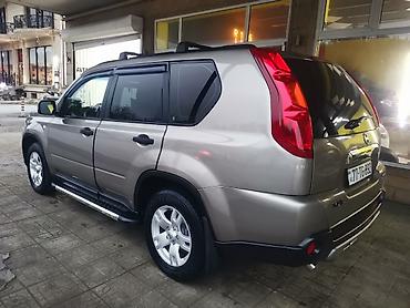 jetta 2008: Nissan X-Trail model avtomobili. Açıq qəhvəyi rəngdə, dam relsləri ilə — 8