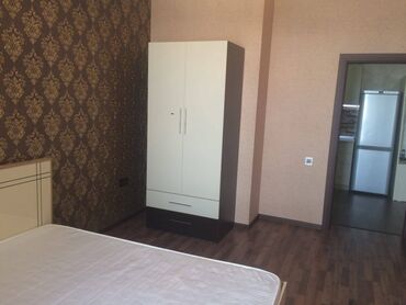 Uzunmüddətli kirayə mənzillər: Nərimanov metrosuna yaxin 14 mertebeli binanın 7-ci mərtəbəsində — 7