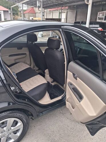 Hyundai: Hyundai Accent: 1.4 l | 2008 il Sedan — 15