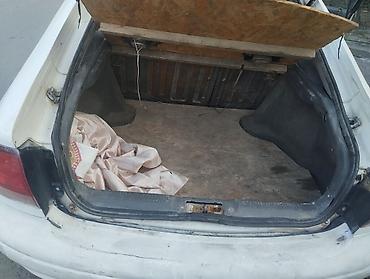 mini coper: Легковой автомобиль хэтчбек, 5 дверей, белый цвет. Салон тёмно‑серый — 4