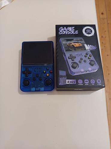 nintendo 3 ds: Portativ oyun konsolu – Model R36S - Korpus: şəffaf mavi dizayn — 1