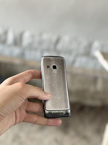 kontakt iphone 15 pro: Samsung S5610, rəng - Qara, Düyməli — 5