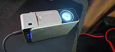 Проекторы: LED Проектор T6 Размер проектора: 25х17х8см. Вес: 1,28 кг. Яркость — 1