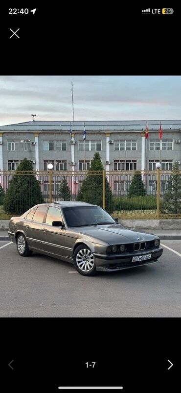 сполер е34: Автомобиль BMW 5 серии в кузове E34, окрашенный в серый цвет. Эта