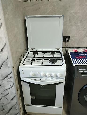 Газовая плита Indesit, классический белый цвет. Характеристики: - 4